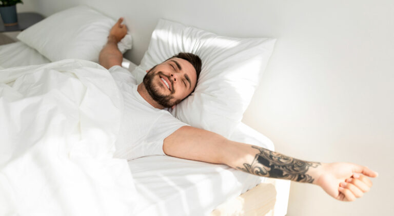 man waking up well rested